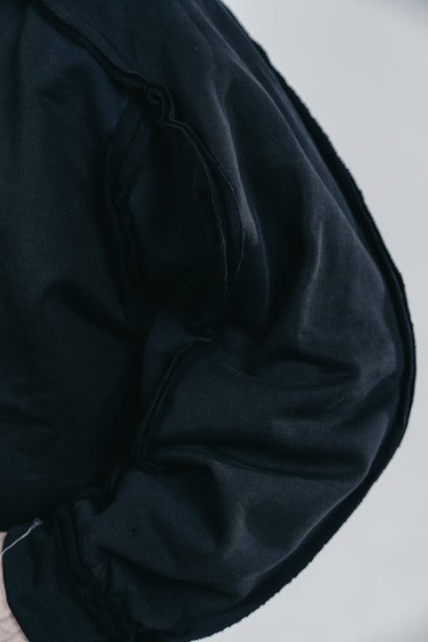Sudadera negra cortes