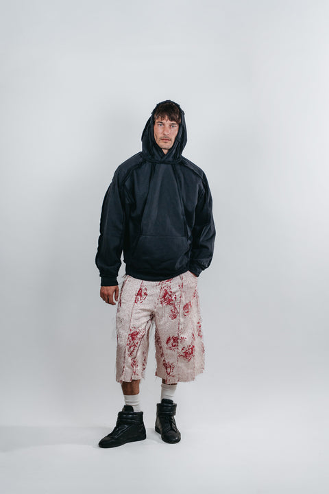 Sudadera negra cortes